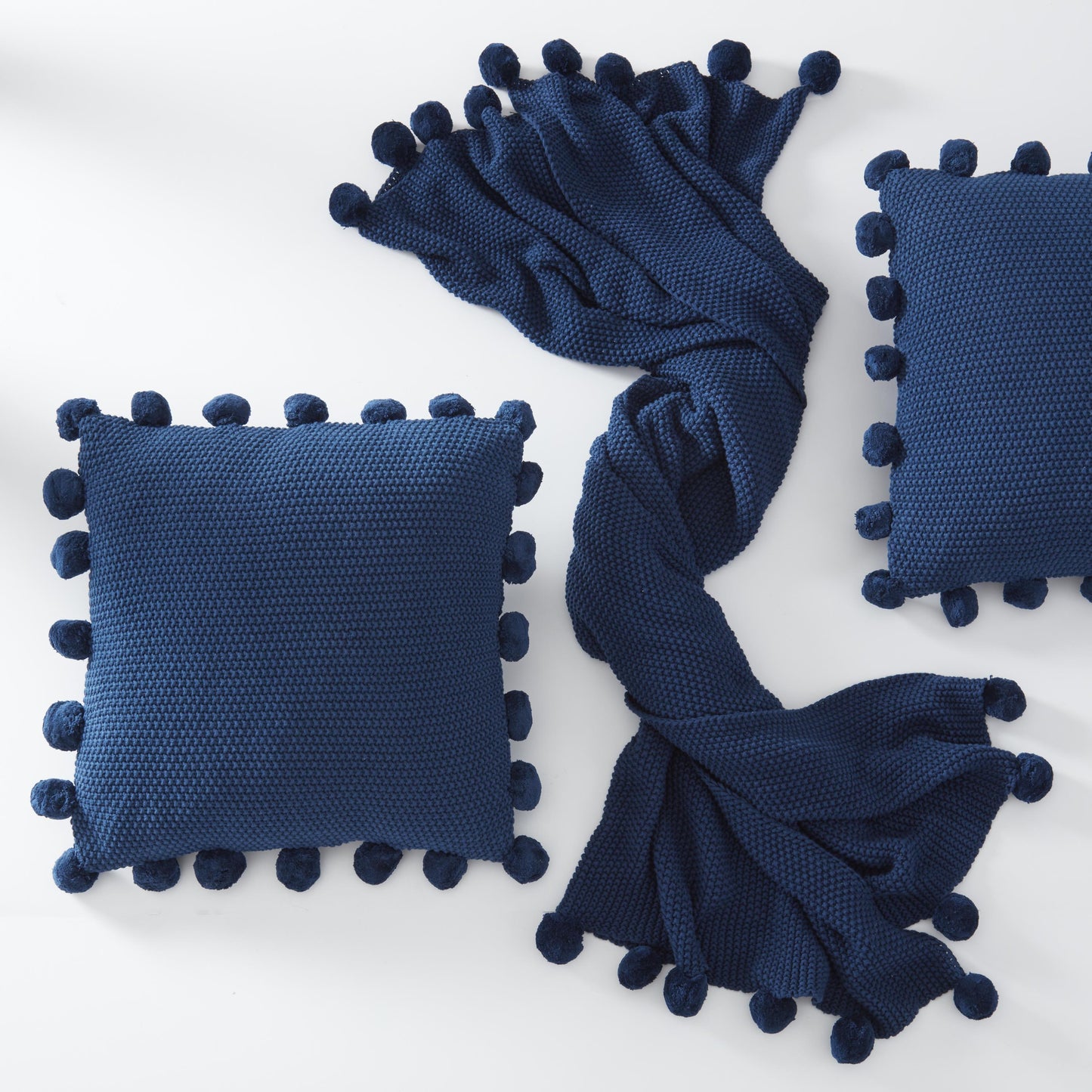 Dark Blue Moss Stitch Knit Pillow with Pompom Trim