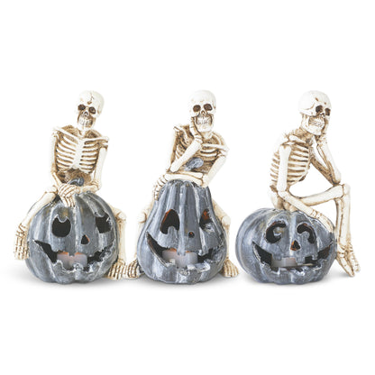 Resin Skeletons on Gray LED Jack-O-Lantern